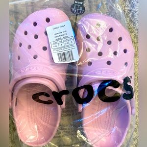 Crocs, kids size 5, color is ballerina pink, brand new with tags